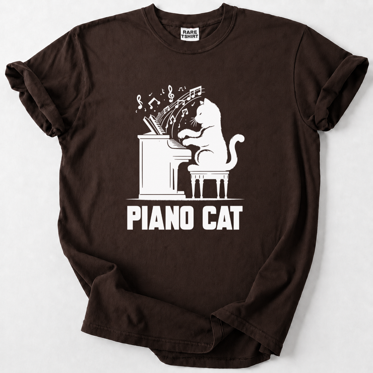Rock a playful Piano Cat design on soft, premium cotton. The perfect gift for cat lovers, pianists &amp; music fans