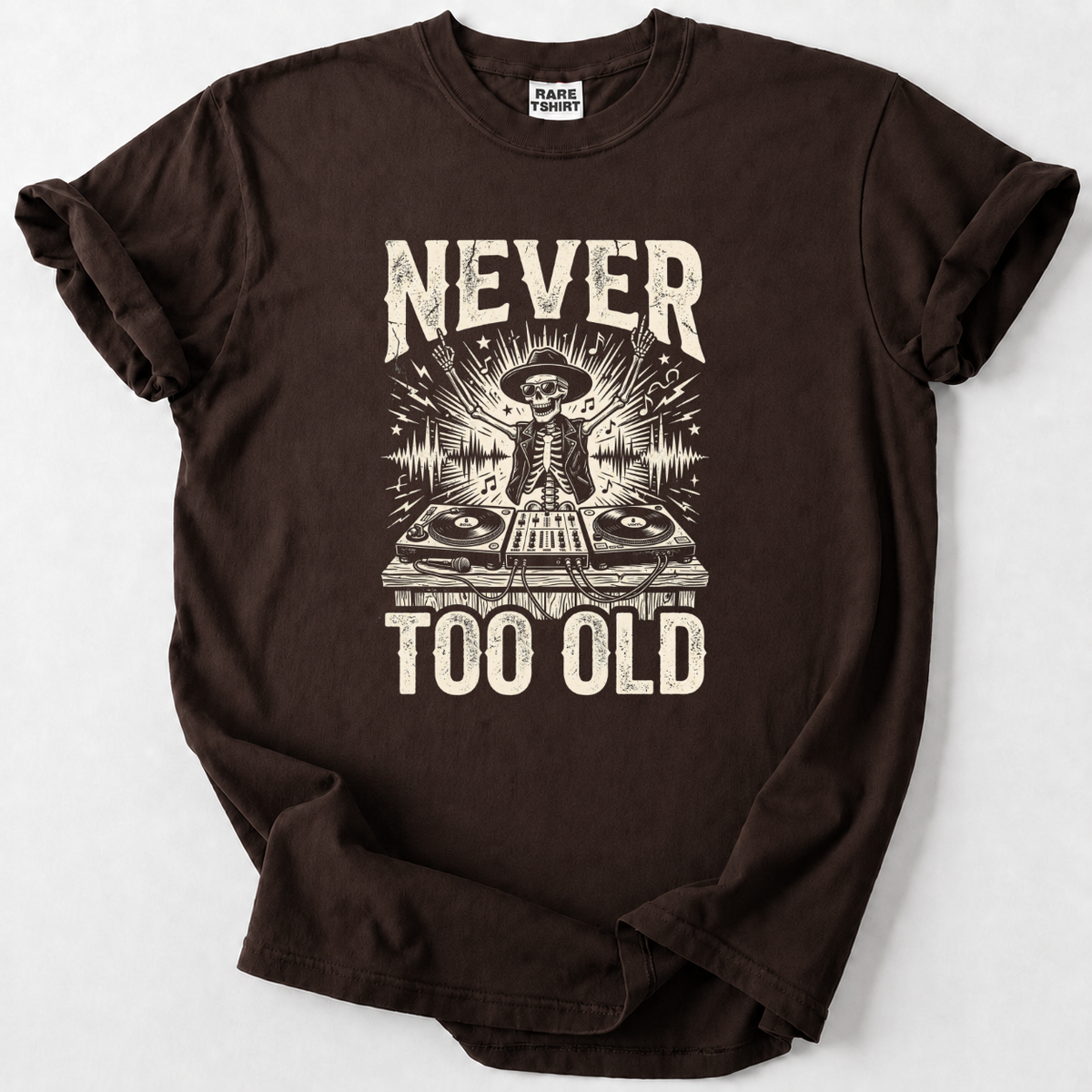 Rock the decks at any age with our Never Too Old DJ Skeleton Tee. Premium soft cotton, bold vintage graphic 