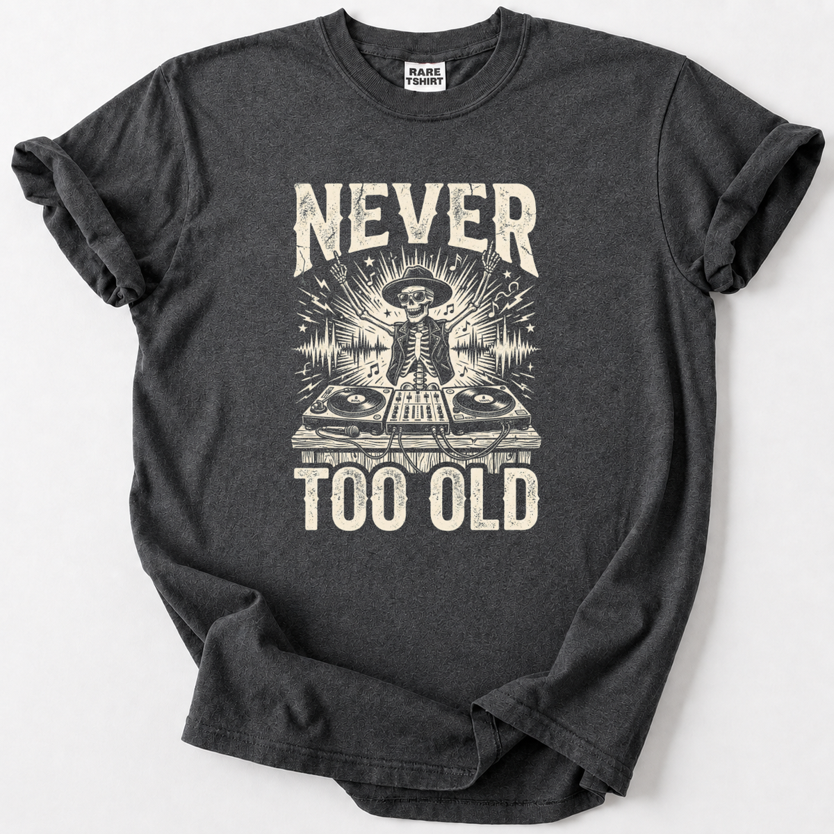 Rock the decks at any age with our Never Too Old DJ Skeleton Tee. Premium soft cotton, bold vintage graphic 