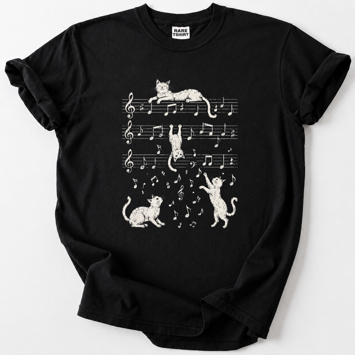 Playful cats dance across the staff lines in this whimsical music-lover's tee. Soft, premium cotton for everyday comfort.