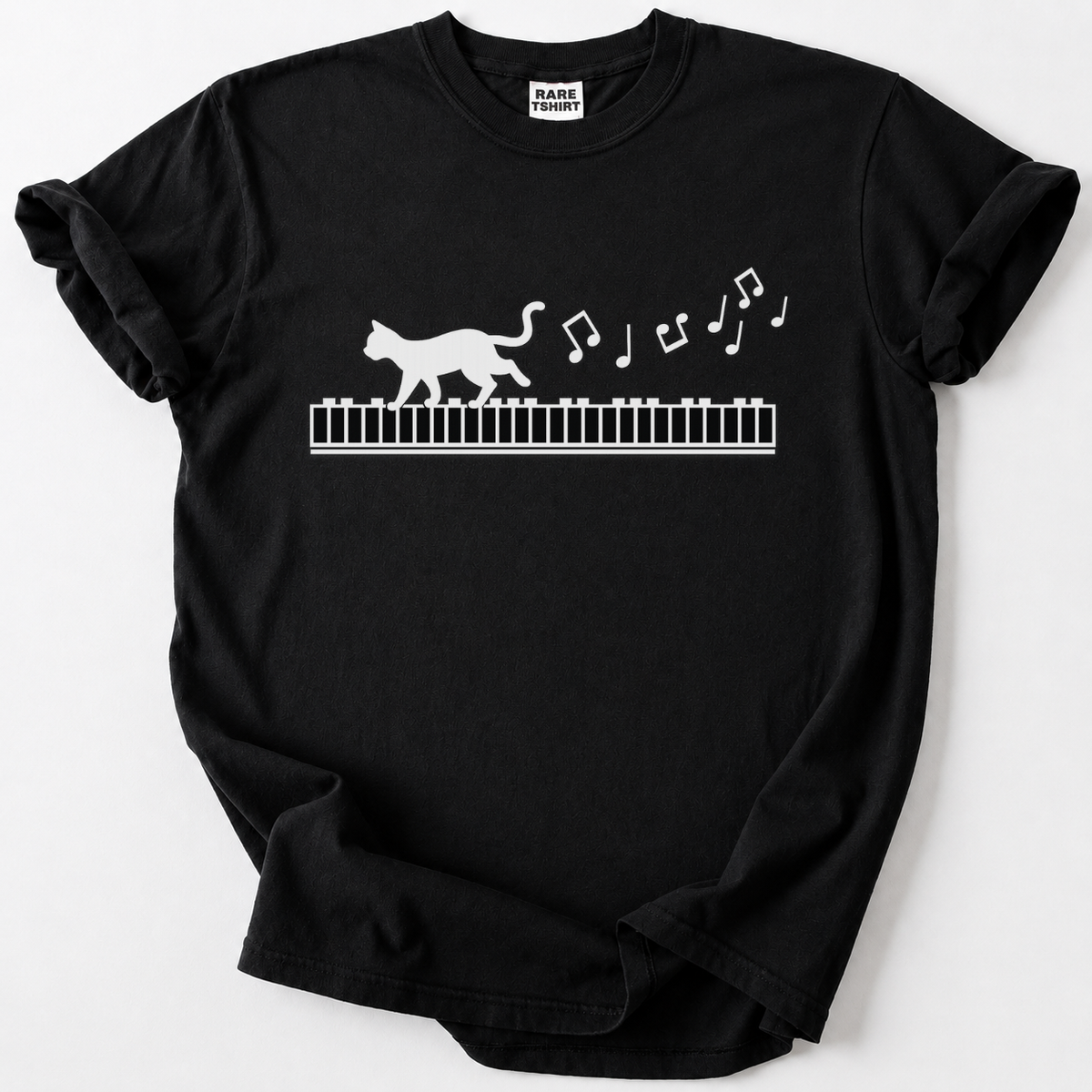 Whimsical cat-on-piano graphic tee for music lovers. Soft, premium cotton comfort meets rare artistic design. The perfect gift for pianists &amp; cat lovers.