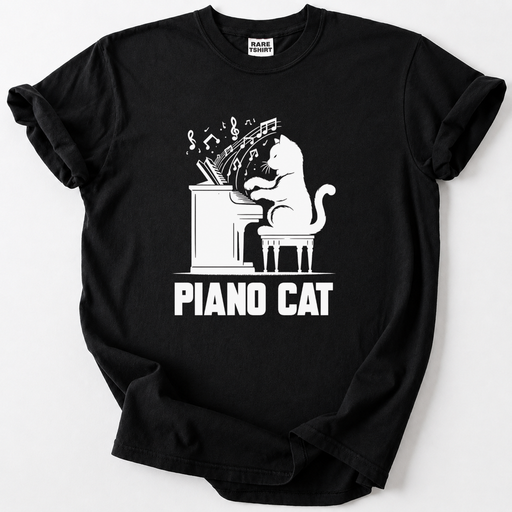Rock a playful Piano Cat design on soft, premium cotton. The perfect gift for cat lovers, pianists &amp; music fans