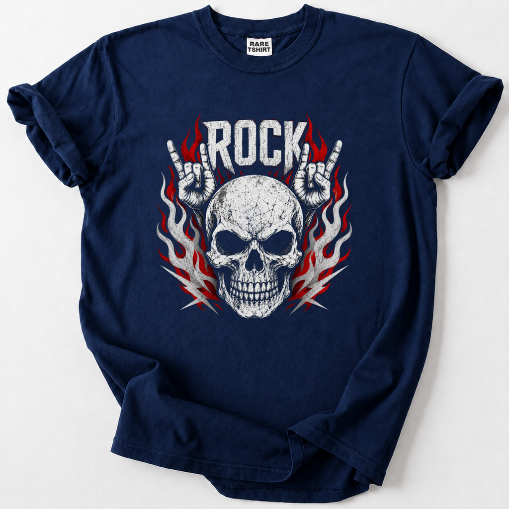 A navy blue short-sleeve t-shirt with a graphic print of a skull, flames, and hands making the rock gesture, with the word 'ROCK' above. The shirt is laid flat on a light gray background.