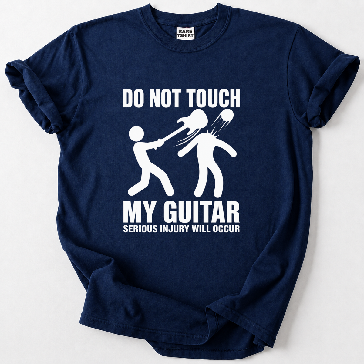 A navy blue short-sleeve t-shirt with a white graphic print that reads 'DO NOT TOUCH MY GUITAR SERIOUS INJURY WILL OCCUR' accompanied by a stick figure illustration of a guitar fight. The shirt is laid flat on a light gray background.