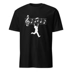 Black t-shirt with treble clef and playing child, music-inspired graphic tee design
